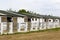 Large animals stables filled with horses