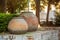 Large antique pots near of the ruins of the Flavian Amphitheater in Pozzuoli.