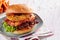 Large appetizing Hawaiian burger with bacon