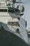 A large army warship close-up. Front side view. Ship\\\'s side and captain\\\'s bridge