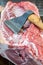 Large ax for chopping meat, meat carcass. Close up. Large piece of meat. Vertical