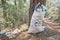 large bag of garbage and waste in a nature Park in the woods. The inscription in Turkish