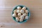 Large baked soup crackers in a green bowl