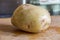 Large Baking Potato on Chopping Board