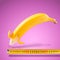 Large banana and measuring tape