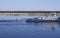 Large barge and motor boat on the Volga