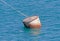 Large barrel floating in sea water for mooring  ships
