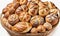 Large basket full of assorted breads isolated on white background