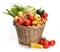 Large basket of vegetables. Isolate on white background