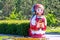 A large beautiful folk doll stands on the Volga River Embankment.