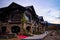 Large beautiful mountain lodge architecture with blue hour sunset