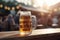 Large beer mug on table of outdoor restaurant