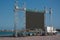 Large blank open-air outdoor LED screen for public event on sea shore