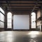 Large blank white board sits in an old factory converted into a contemporary studio