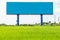 Large blue advertising billboard in green rice field. for design