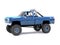 A large blue pickup truck off-road. Full off-road training. Highly raised suspension. Huge wheels with large spikes for