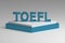 Large blue TOEFL exam letters