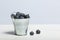 Large blueberries in a decorative bucket. International day without diets. On a white background. Close-up