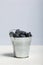 Large blueberries in a decorative bucket. International day without diets. On a white background. Close-up