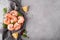 large boiled shrimp with lemon on a gray plate