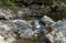 Large boulders and a peaceful stream in Arkansas