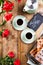 A large bouquet of red cups of tea and delicious Belgian waffles for a festive breakfast. Romantic Gift for women. The concept of