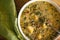 A large bowl of Zuppa Toscana made with sausage, potatoes, kale and red pepper in a creamy chicken broth.