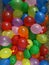 Large box of colourful water balloons bombs