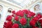 Large bright bouquet of red roses in hall