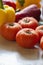 Large and bright tomatoes on the kitchen table