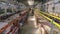 Large bright warehouse with long rows. Long rows of warehouse with cardboard boxes.