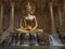Large Buddha statue stands tall on a rock in the heart of a picturesque valley