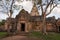 Large buddhist temple Asia with native trees