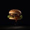 A large burger is levitating over a wooden table on a dark background. Hot fresh burger