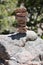 A large cairn or pile of stones on a Colorado mountain trail