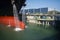 A large cargo ship in the dry dock awaits maintenance in shipyardâ€‹