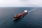Large cargo ship sailing on the sea, view from the Drone