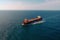 Large cargo ship sailing on the sea, view from the Drone