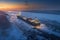 A large cargo ship traveling down a frozen river. Generative AI image.