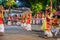 large carnival festive procession with elephants and dancers in bright national costumes through the streets of Colombo