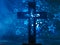 Large catholic cross on a blue background with stars. There is no one in the photo. Religion, catholicism, faith, spirituality.