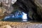 Large cave on a rocky beach from Greece