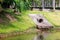 Large cement sewer drain pipe into the lake in the park