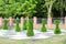 Large chess pieces decorated with green grass