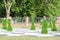 Large chess pieces decorated with green grass