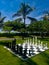 A large chessboard in a beautiful garden