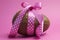 Large chocolate Easter egg with pink polka dot ribbon