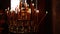 Large church golden candlestick with burning candles in orthodox church