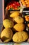 Large citrons on a crate in a fruit market.