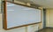 Large classroom white board with wooden frame